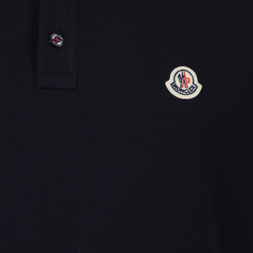 Polo shirt with logo and piping